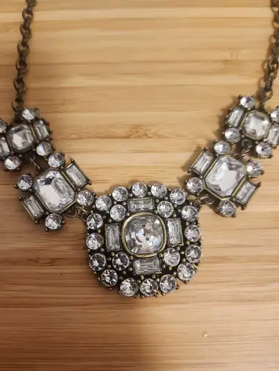 Add a touch of sparkle to any outfit with these necklaces! The first necklace features a collection...