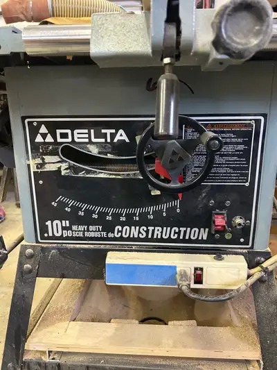 Good condition 10” delta table saw with sliding Excalibur table (403) 869 6781