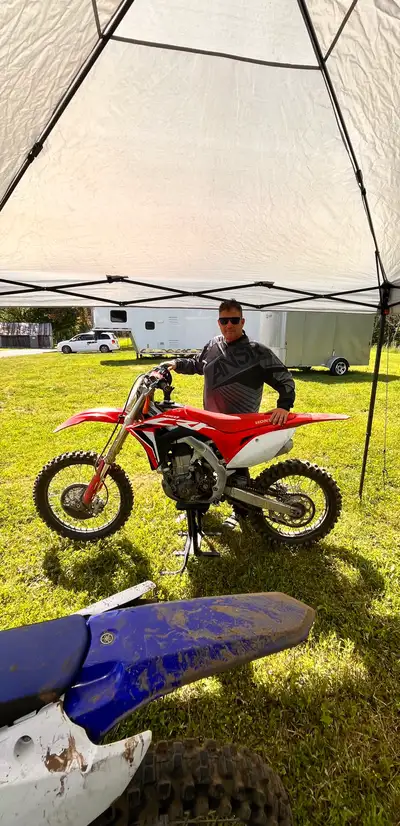 I'm selling my Honda CRF450R, a high-performance dirt bike designed for motocross and off-road adven...