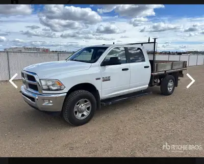 112,000km https://www.rbauction.com/pdp/2015-ram-3500-4x4-crew-cab-flatbed-truck/15275906 Click on t...