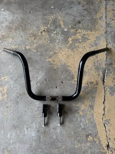 12” Harley Davidson handle bars with risers Grips are 1” rest of the bars are 1 1/4” chubby bars