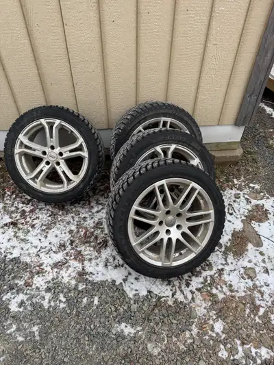 Selling 4 aftermarket Aluminum rims for an Audi or VW. Winter tires have a lot of tread remaining $2...