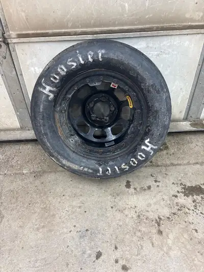 Bassett 15” 5 bolt rim with a Hoosier 26.5/8-15 race tire