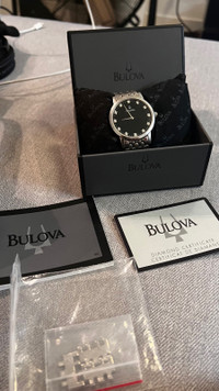 Bulova men’s classic diamond 38mm quartz with box and papers 