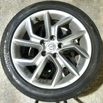 Selling a set of 2 OEM Nissan aluminum alloy rims with Pirelli Cinturato P7 all-season tires (R17) m...