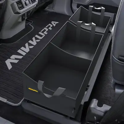 Under seat storage used in Ford F150 truck, black.