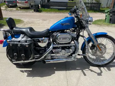 2002 Harley Davidson Sportster 1200 Custom. Screamin Eagle exhaust. 20,200 kms. Lots of chrome, exce...