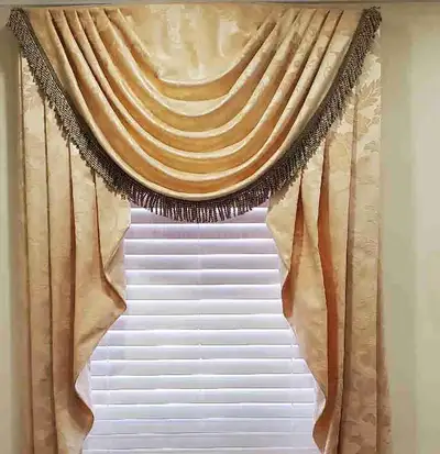 Two beautiful window cover curtains 39" wide and 70" hight with hardware for sale. Make an reasonabl...