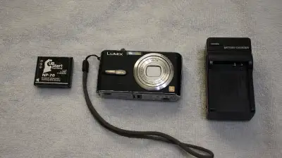 Camera is in great condition and functions 100% with no issues. comes with new battery and charger....