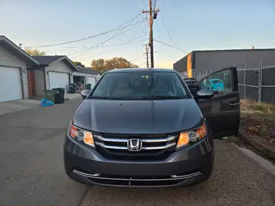 2016 Honda Odyssey EX, 86,000 km Has power sliding doors, three-zone automatic climate control, back...