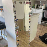 Mirror adorned with “Stranger Things” stickers