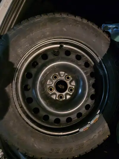 Winter tires 225/65/17 from 2009 Ford Escape Like new winter tires and rims, used one season approx...