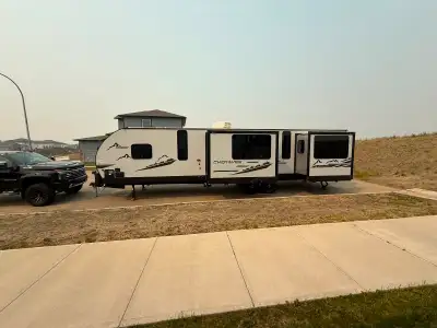 Located in Grande Prairie AB We purchased this trailer and have never used it , brand new stickers s...
