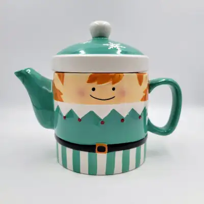 Christmas Elf Teapot Serving Tea Read, View more