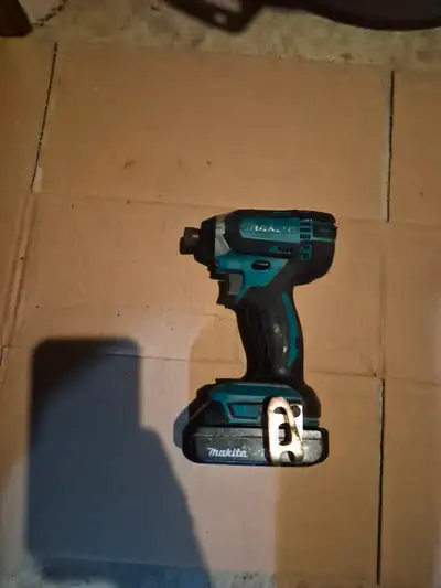 Makita Impact Driver amd battery, View more