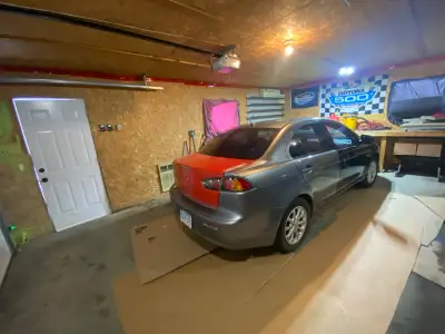 Selling 2012 Mitsubishi lancer Car is in really good condition for the year Has all new body panels...