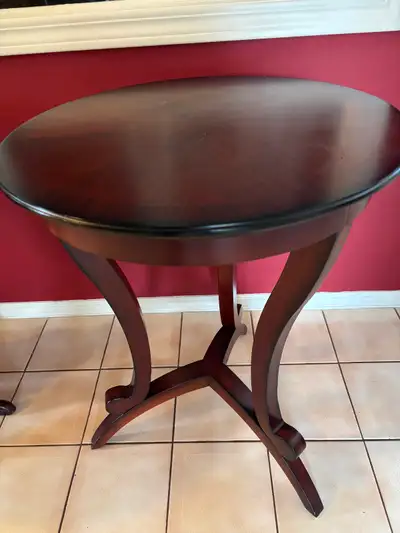 Bombay Company round, gently used three legged end table Few scratches as seen in the picture from n...