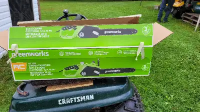 Electric Chain Saw used once still in box. Call or text 506-381-2482 or call and leave message 506-3...