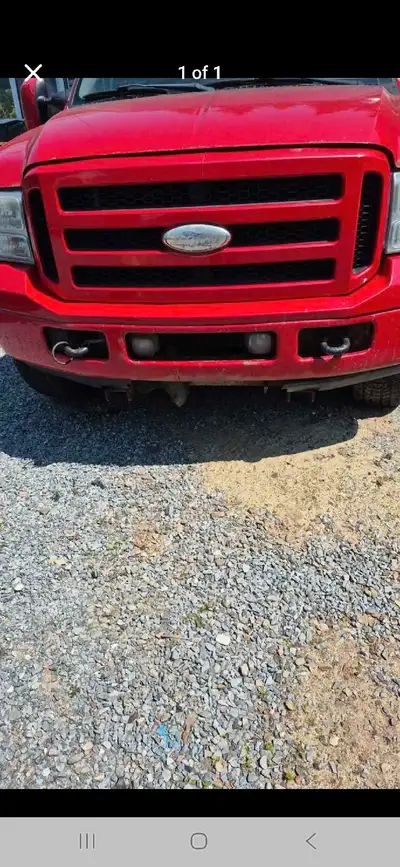 Good condition grill and bumper off f350 super duty ford asking 350$