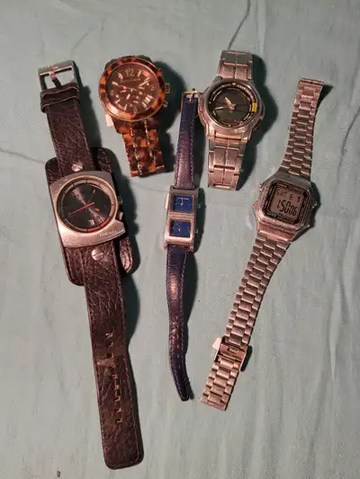 Batteries a changé. -Diesel dz-2046....VENDU -Montre alfred sung Dual dial , double movement.....30$...