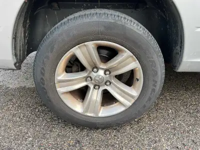 These are 20-inch Ram rims paired with Goodyear Wrangler tires, They still have plenty of life left...