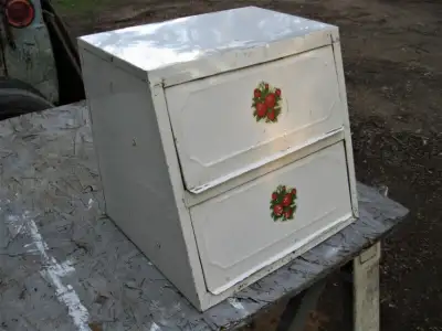 Vintage Antique Two Shelf Slanted Bread Box. Measures 15 x 14.5 x 13 inches. Has a dent on top, slig...