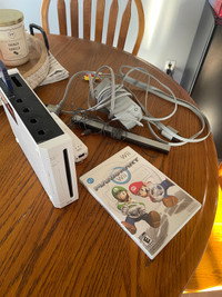 Wii that comes with Mario kart, Wii-mote, memory card, all cable