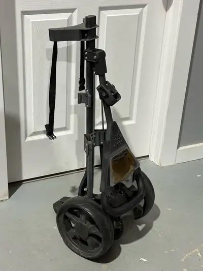 Up for sale is a clean and fully functional 3-wheel folding golf push cart in good used condition. T...
