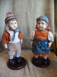 Hummel Style Porcelain Hansel & Gretel Dolls with stand