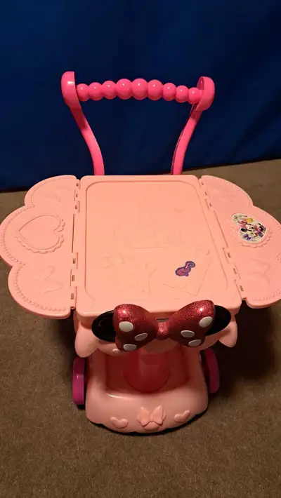 Good used condition, Minnie Mouse tea cart. From a pet free, smoke free home.