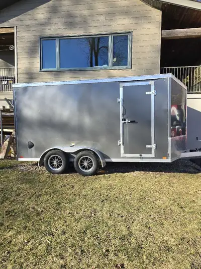 Mint condition enclosed trailer. Used for two years to store snowmobiles. Used only twice to move sn...