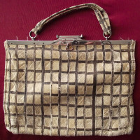 Petit sac de cérémonie en bandes de cuir fin cousues