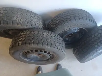 4- 215/65/16 hercules avalanche winter tires on rims 5 x 105 Used one winter, 90% tread left Came of...