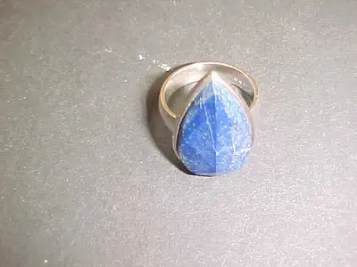 THIS DEEP BLUE RING IS BY SILPADA. THIS LAPIS LAZULI RING IS .925 STERLING SILVER. IT IS MARKED 925...