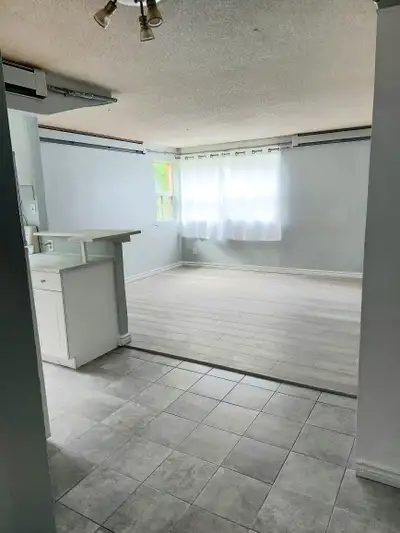 First time available in years! Spacious studio apartment on the ground floor in a secure three story...