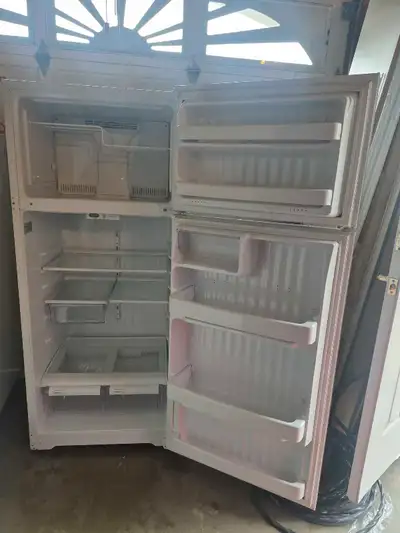 GE fridge with top freezer , View more
