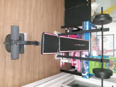 Weight Bench and weight-lifter, View more