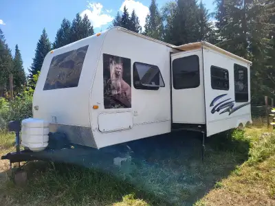 Ready for your next adventure. This trailer was converted into a spacious character home. The queen...