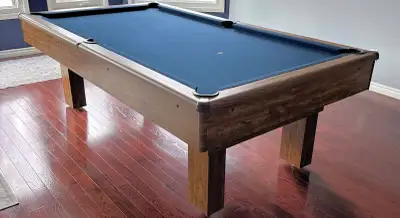 Pre-Owned Canada Billiard 4′ x 8′ slate pool table. Made in Canada. A durable pool table with 3/4″ t...