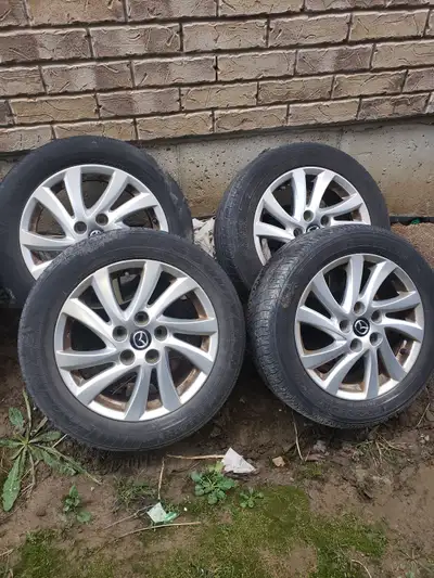 Sold the car - 2013 Mazda 3. Will fit 2009-2013 models. Rims are OEM Mazda 3 Tires good for 1 more s...