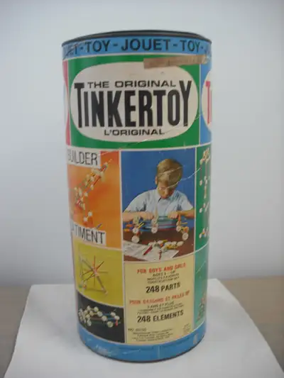 Original Tinkertoy by Questor 1972. Comes with pieces and instruction/idea book. Most pieces are the...