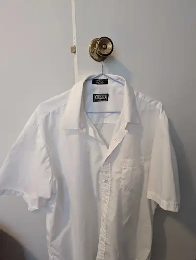 White dress-up shirt with no sleeves, View more