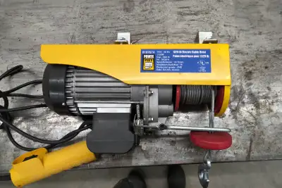 Power Fist hoist for sale, model 8107674, 110 volt, cap: 660/1320 lbs. Mount - 1.75" x 2". Never bui...