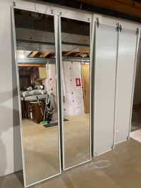 Sliding mirror doors