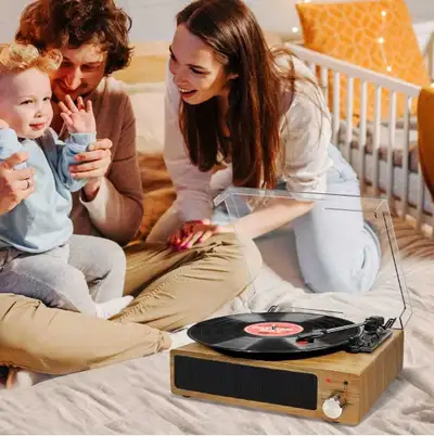 Enjoy your favourite music with this Bluetooth wireless turntable! It has built-in stereo speakers a...