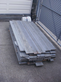 $4:00ea. Salvaged 1x6x5ft rough cut fence boards, stained