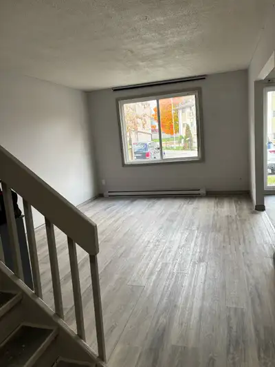 Spacious two bedroom apartment with unique two level layout. Main floor features, kitchen, living ro...