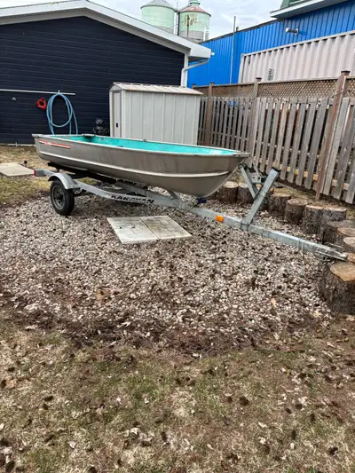 12’ aluminum boat with oars no leaks and trailer for sale have ownership for trailer $1500 No trades