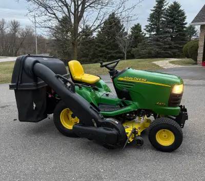 John Deere X475 ready to go for all seasons! Well maintained.. 23 hp liquid cooled Kawasaki engine....