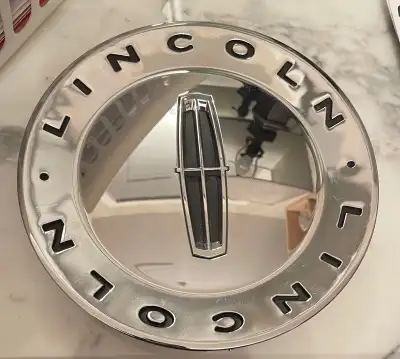 Lincoln LS chrome finish wheel cap. Brand new.